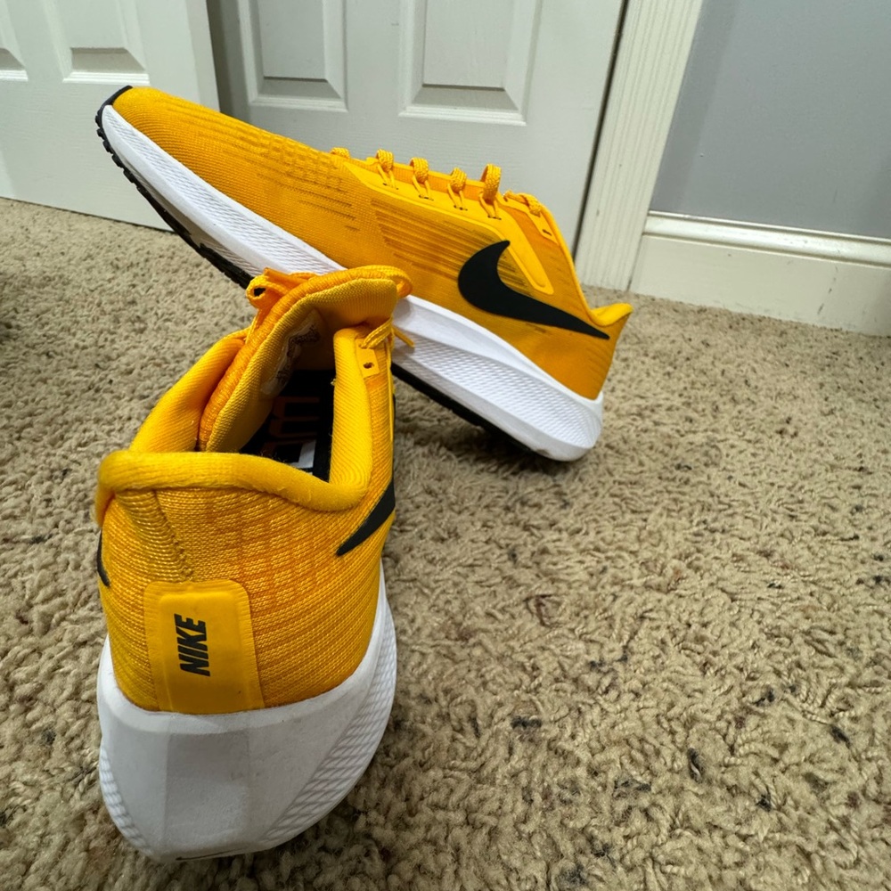 Yellow Nike Tennis shoes